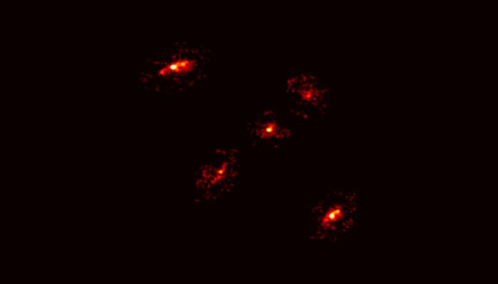 a-newly-discovered-‘einstein’s-cross’-reveals-the-existence-of-a-giant-dark-matter-halo